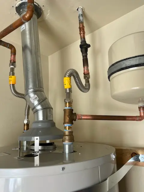 Water heater installation and plumbing repair in The Country